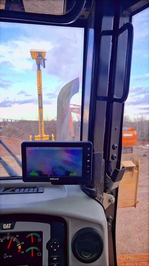 Orange Excavator in Action at Construction Site
