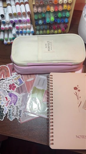 This Bible journaling kit comes with everything you need to get started in Bible journaling. It includes highlighters, stickers, sticky notes, bookmarks, colored, and black pens, a notebook in a carrying case to hold it all. #BibleJournaling #biblestudy #ChristianTikTok #christian #BibleJournalingKit