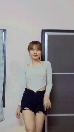 Dance Routine in Crop Top - Dynamic Indoor Performance