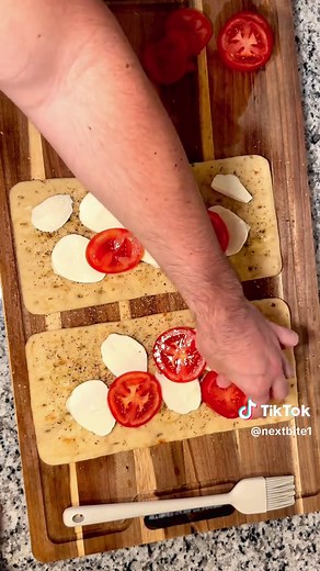 MARGHERITA FLATBREAD 🍅🍃 Love this in the Summer bc it’s light, fresh, and quick! Ingredients: 2 Flatbreads 2 Vine Ripe Tomatoes Fresh Mozzarella Fresh Basil Pesto (homemade preferably!) Olive Oil Dried Oregano Garlic Powder Black Pepper Salt Directions: 1. Preheat oven to 375 degrees 2. Slice Tomato and Fresh Mozzarella into quarter inch slices 3. Brush flatbread with olive oil 4. Sprinkle both flatbread with dried oregano, garlic powder, pepper, and salt 5. Arrange mozzarella and tomato on th