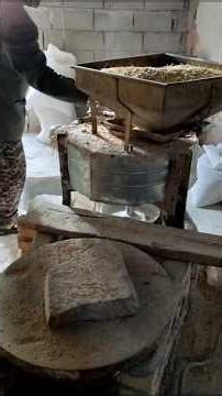 Grinding Wheat the Old-Fashioned Way with a Stone Mill