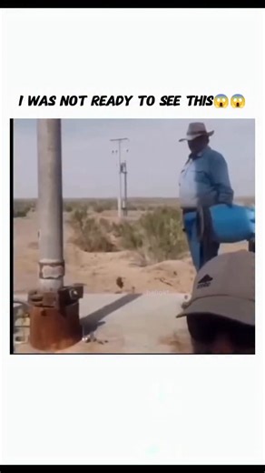 clipperz.ig on Instagram: "In this short, comedic video, two workers are seen in an arid, desert-like outdoor setting, laboring over a vertical pipe or wellhead. The first worker, wearing blue trousers and a grey shirt, is swinging a large sledgehammer with significant force against a component at the base of the pipe. Standing nearby is his colleague, an older man in a wide-brimmed hat, who appears to be supervising or waiting to assist. The scene maintains a realistic, industrial tone for the