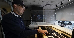 Why is there organ music at baseball games?
