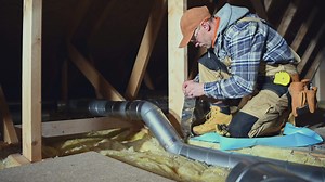 Building Residential Ventilation System. Worker Assembly Air Ventilation Pipes. House Attic. Industrial Theme.