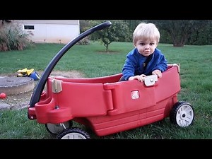 Taking Clark for a Backyard Wagon Ride