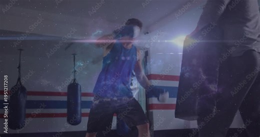 Trainer holding pads as boxer punching and kicking during boxing training, galaxy overlay building