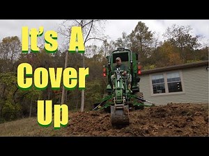 John Deere 1025R: It's A Cover Up
