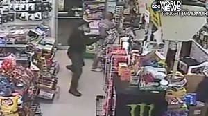 17K views · 81 reactions | WARNING SHOT: The sheriff in Pasco County, Florida, announced the arrest of the robbery suspect in this frightening surveillance footage, wearing a gas mask and tactical vest and threatening the clerk with a shotgun; he fired a single round into the ceiling before taking off — and is now being held on $155,000 bond. https://abcn.ws/1c6SfMC | ABC World News Tonight with David Muir | Facebook