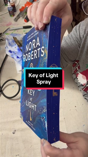 Key of Light by Nora Roberts, Book 1 of the Ley Trilogy. I love the gold on this!!! Etsy listing link in the comments #sprayededges #sprayedbookedges #keyoflight #keyoflighttrilogy #noraroberts #norarobertsbook #norarobertstrilogy #booktok #fyp