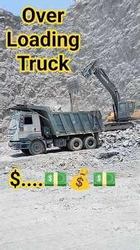 Loading stones into a truck #excavator #bulldozer #volvoexcavator