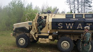 1,000 Lakes SWAT Team conducting some live fire training in the rain with their newly acquired MRAP. | Mission Critical Concepts Training