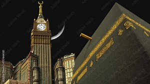 Timelapse of Holy mosque of Mecca and Makkah Clock Royal Tower. Haram Mosque minaret in a cloudy day. Mecca, Islam’s holiest city and the central Masjid al-Haram, Sacred Mosque surrounds the Kaaba.