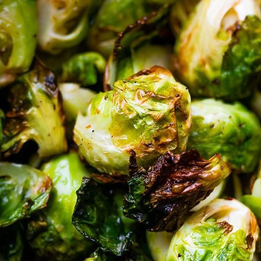 Air fryer brussels sprouts are crispy on the outside and tender on the inside. With five simple ingredients, they can be prepped and on your table in under 15 minutes! Grab the recipe: https://sweetpeasandsaffron.com/air-fryer-brussels-sprouts/ | Sweet Peas & Saffron