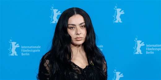 Charli XCX's Sheer Black Knit Minidress Is So Gothic, It's Practically Falling Apart at the Seams
