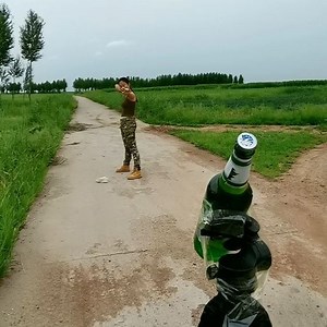 17K views · 360 reactions | A woman opens a bottle of beer with a slingshot from a dozen feet away in just one go. She clearly has found a fancy new way to start a party. #FunChina | China Plus Culture | Facebook