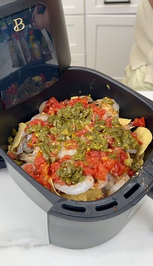 15K views · 29 reactions | Easy Air Fryer Appetizer! Danny N shares a yummy appetizer using, tortilla round chips, raw shrimp, taco seasoning mix, rotel original, diced jalapeños, taco blend shredded cheese, queso quesadilla shredded cheese and cilantro lime salsa. | Cooking With Danny | Facebook