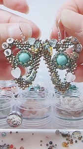 Mermaid encrusted heart earrings are ready!! 🧜‍♀️💙🩵💚 I think they are really fun 🤩 What do you think? Would you wear? 💓 #mermaidjewelry #mermaidearrings #beadedearrings #heartearrings #beadweaving #makersmovement #whimsical #studiotime | Seed Bead Bliss