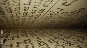 Exploring sacred jewish heritage scriptures on hebrew. Details of the Torah. Tradition and wisdom, macro footage. Letters and symbols.