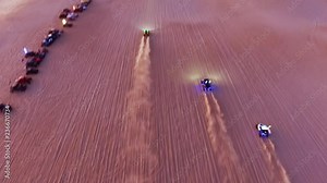 Dune buggies take off in a drag race through the desert