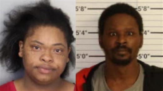 Man, woman charged with running over repo man