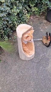 145K views · 3K reactions | Poppy. A free style cat carving with a contemporary feel giving the viewer the illusion of a full 3D cat walking. Carved with chainsaws and power tools, and added paint highlights  #Elegantchainsawcarvings | Elegant Chainsaw Carvings | Facebook