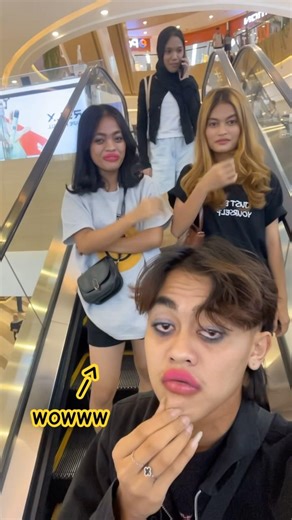 This woman laughs because of her red lips