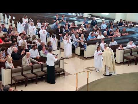 Receiving First Holy Communion