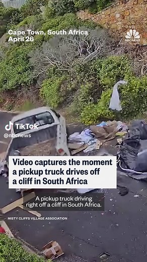CCTV footage captured the moment a pickup truck crashed off a cliff in Cape Town, South Africa. The driver miraculously managed to exit the vehicle unscathed.