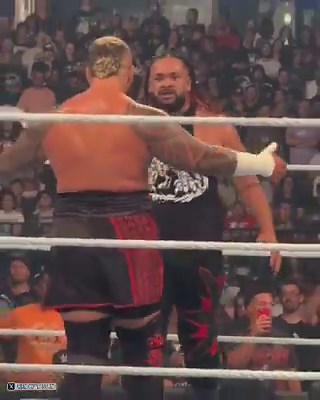 OFF-AIR FOOTAGE (UNSEEN): When Jacob Fatu made his WWE debut on SmackDown. During the commercial break, the lights were dimmed while production played ads on the LED tron. Jacob was caught wearing a black hoodie, hiding among the crew members to ensure he could safely slip under the ring and stay there until the right moment.