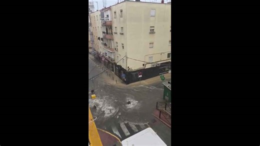 Torrential rain causes powerful street flooding in Seville, Spain