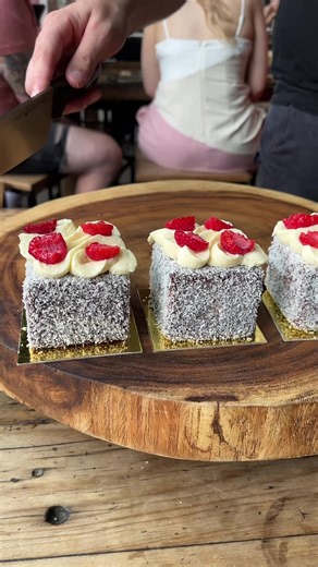 Delicious Lamingtons with Cream and Raspberry Jam