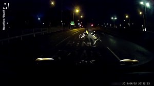 Insurance scammer lies in the road and pretends to be hurt