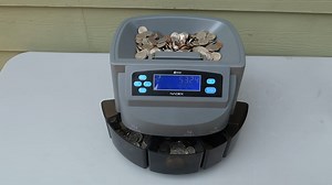 How Fast Can This $200 Coin Sorter Really Count Your Change?