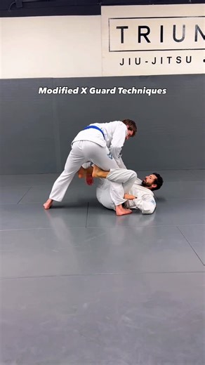 Ari Goldman on Instagram: "Here are 2 modified x guard techniques to gain top position when starting from de la riva guard. Notice the different hip heist get up variations (hand & elbow post). These are solo drills you can practice on your own to improve your movement skills for Jiu Jitsu. Whenever learning new techniques in class, I challenge you to start noticing any movements you can extract and practice in your own. “Move with Intention” #jiujitsuflo #jiujitsu #bjj #brazilianjiujitsu"