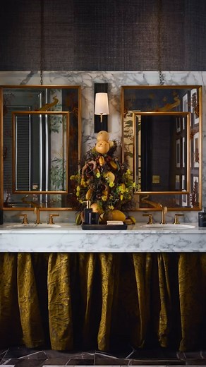 Arteriors on Instagram: "Step into elegance with two rooms by @inkandorocreatives inspired by classic fashion. The “Ladies Room” captures the romantic layers of a French boudoir with curves, velvet touches, and sultry colors. The “Men’s Room,” inspired by the refined style of European suiting, blends structured patterns with floral accents, antique mirrors, and brass details. Featuring our Kapri Sconces, Camella Flush Mount, Eden Sculpture, Dalton Lamp, and Thurlow Sconces. #ArteriorsHome #KBSho