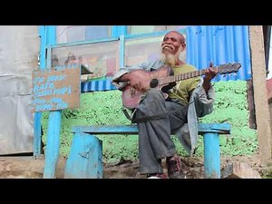 Street Music in Maubisse, Timor-Leste - Timorese Plays Maubisse Folk Song on Guitar