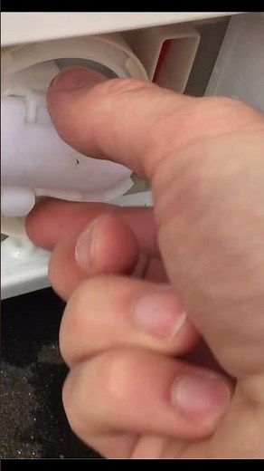 How to clean the filter on an AEG washer dryer. Full of water, stuck in cycle?