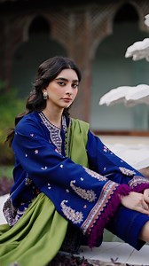 Amaris - Luxury Shawl Unstitched 2025 Launching Online: 22nd Nov, 11:30 PM (pkt) Launching In-Stores & Nationwide: 23rd Nov Azura This deep blue khaddar shirt features an intricate Kashmiri-inspired embroidery theme, beautifully blended with paisley motifs on the front in shades of green, white, pink, and purple. It is paired with a striking parrot green acrylic shawl, adorned with four-sided patti borders and colorful embroidery on the pallu, creating a vibrant and elegant winter ensemble rich 
