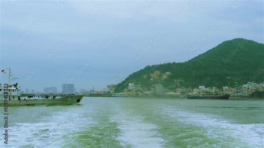 Cargo Barges and Container Ships Transiting Vung Tau River Mouth