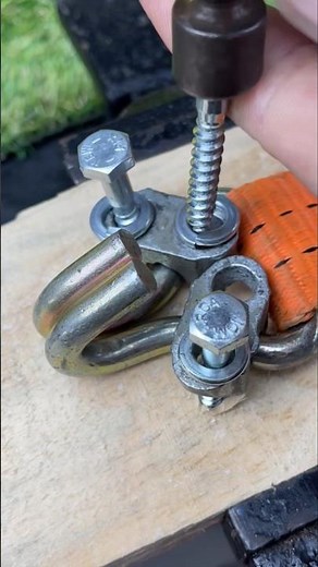 Master uses steel cable clamp to secure the strap#USA #ClampHack #WorkshopHack