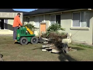Review our Work. Kanga Mini Loader. Demolition of Concrete Garden Feature.
