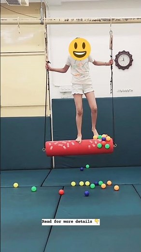 Swinging for Stability: Balance & Sensory Integration Therapy on a Bolster Swing Connecting Dots CDC