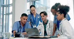 Meeting, healthcare and doctors or nurses on laptop for teamwork, collaboration