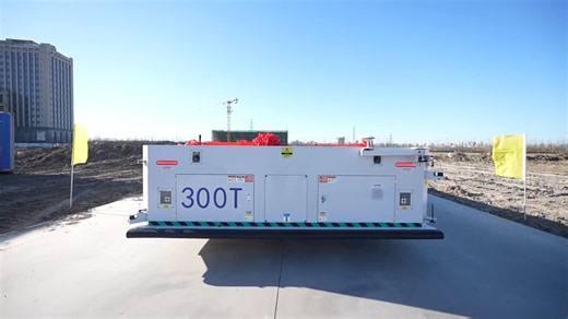 15K views · 142 reactions | A new 300-tonne omnidirectional outdoor heavy-duty AGV rolled off the production line in north China's Tianjin. | China Xinhua News | Facebook