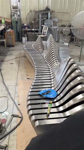 Uniquely shaped stainless steel stools - for mall decoration