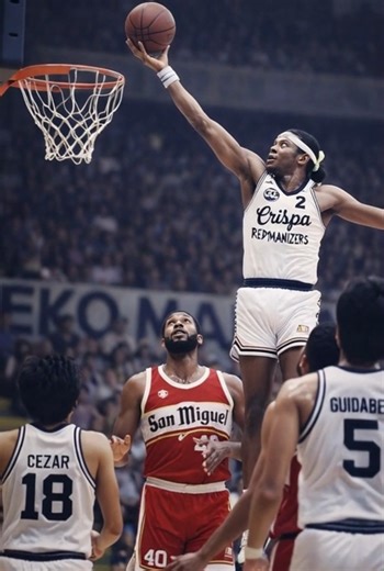 In this iconic moment, Billy Ray Bates of Crispa drives past Richard Adams of San Miguel in 1983. | Senyor Pep