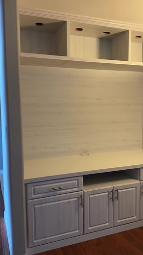 Everything going according to plan. 📄 This light wood tone entertainment center turned out to be every bit as beautiful (and functional) as our clients imagined—and then some. Perfect for cozy fall nights in and hosting loved ones. Location: Closet Factory Designer: Ron Lacey #closetfactory #entertainmentcenter #homerenovation | Closet Factory