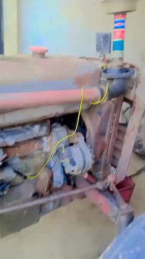 Exploring a Close-Up of a Red Tractor's Engine