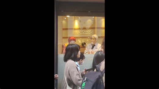 Ronald McDonald and Colonel Sanders cosplay duo together in fast food outlet