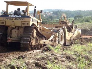 SCRAPER CAT 621B AND D8N STUCK